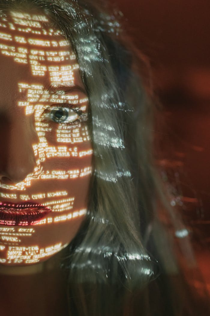 digital Abstract cyberpunk portrait with code projected on a woman's half face, symbolizing technology integration.